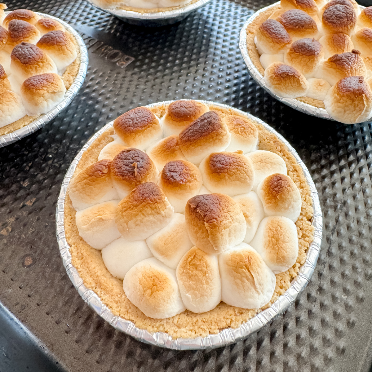close up of mini s'more pies after baking