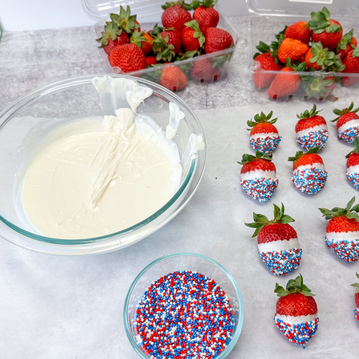 Dipping the chocolate covered strawberries