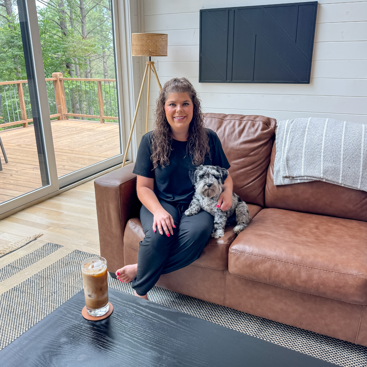 Kylee and Macy sitting on a couch