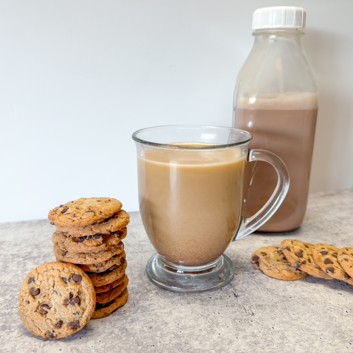 chocolate chip cookies next to cup of coffee