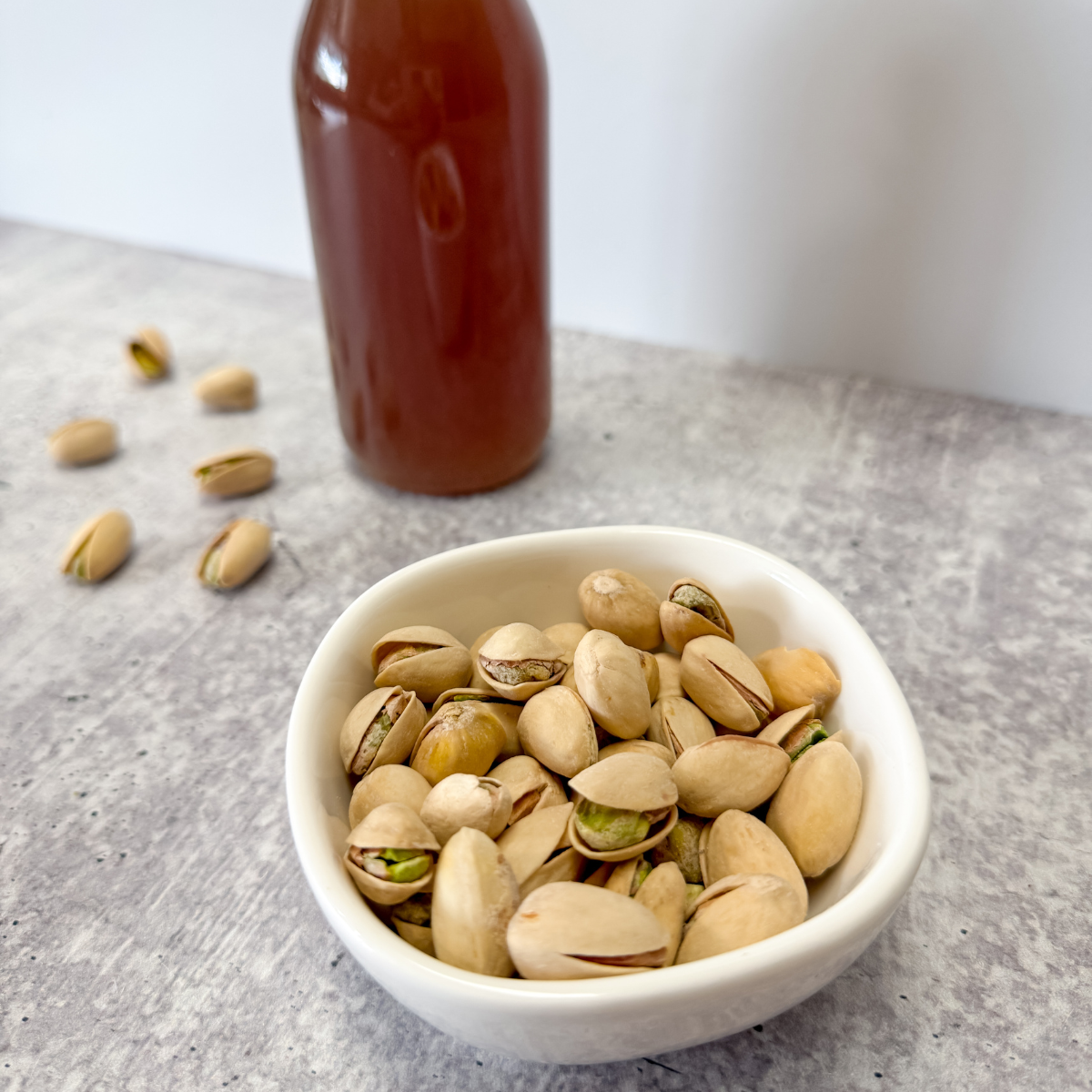 close up of pistachios in a bowl