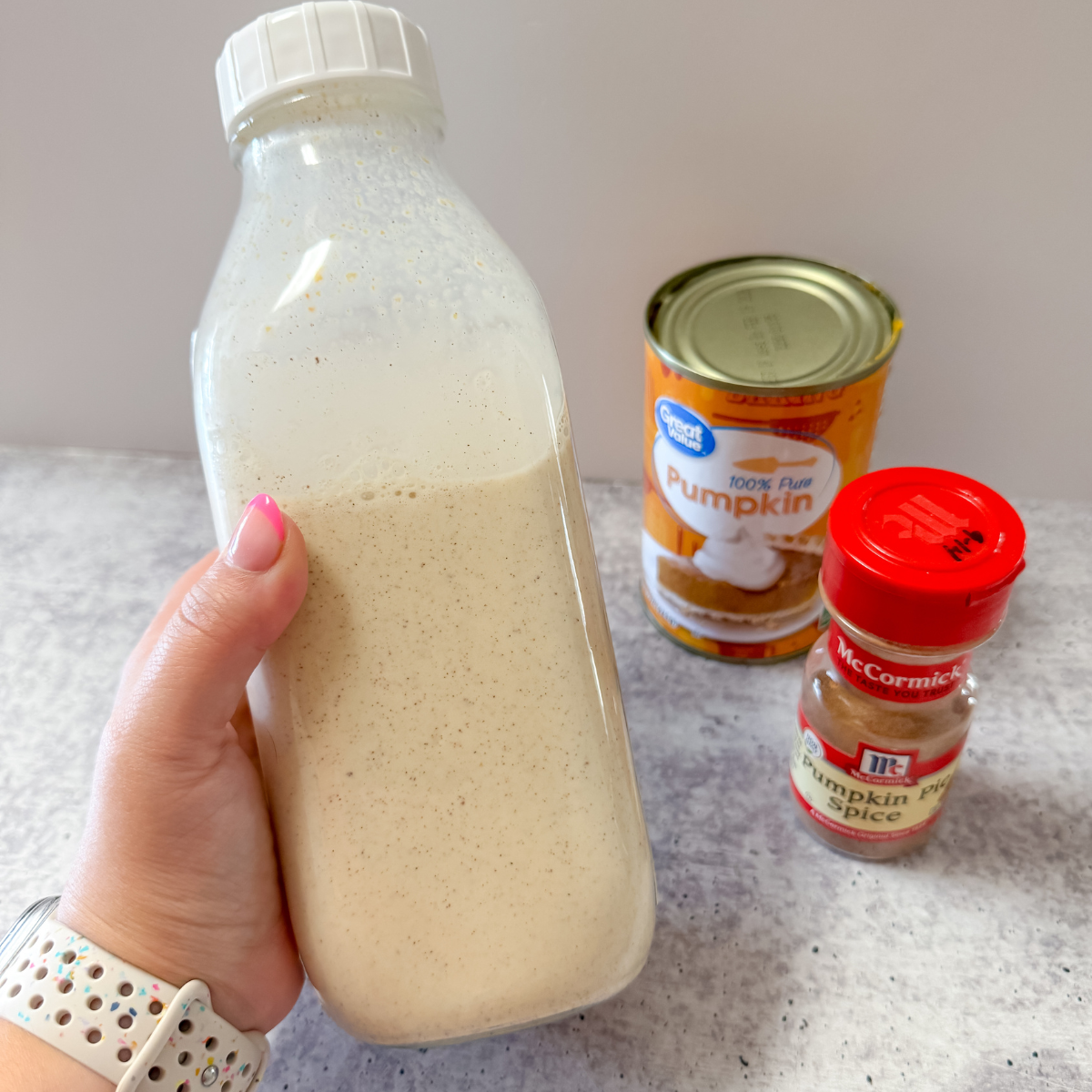close up of pumpkin coffee creamer in a bottle