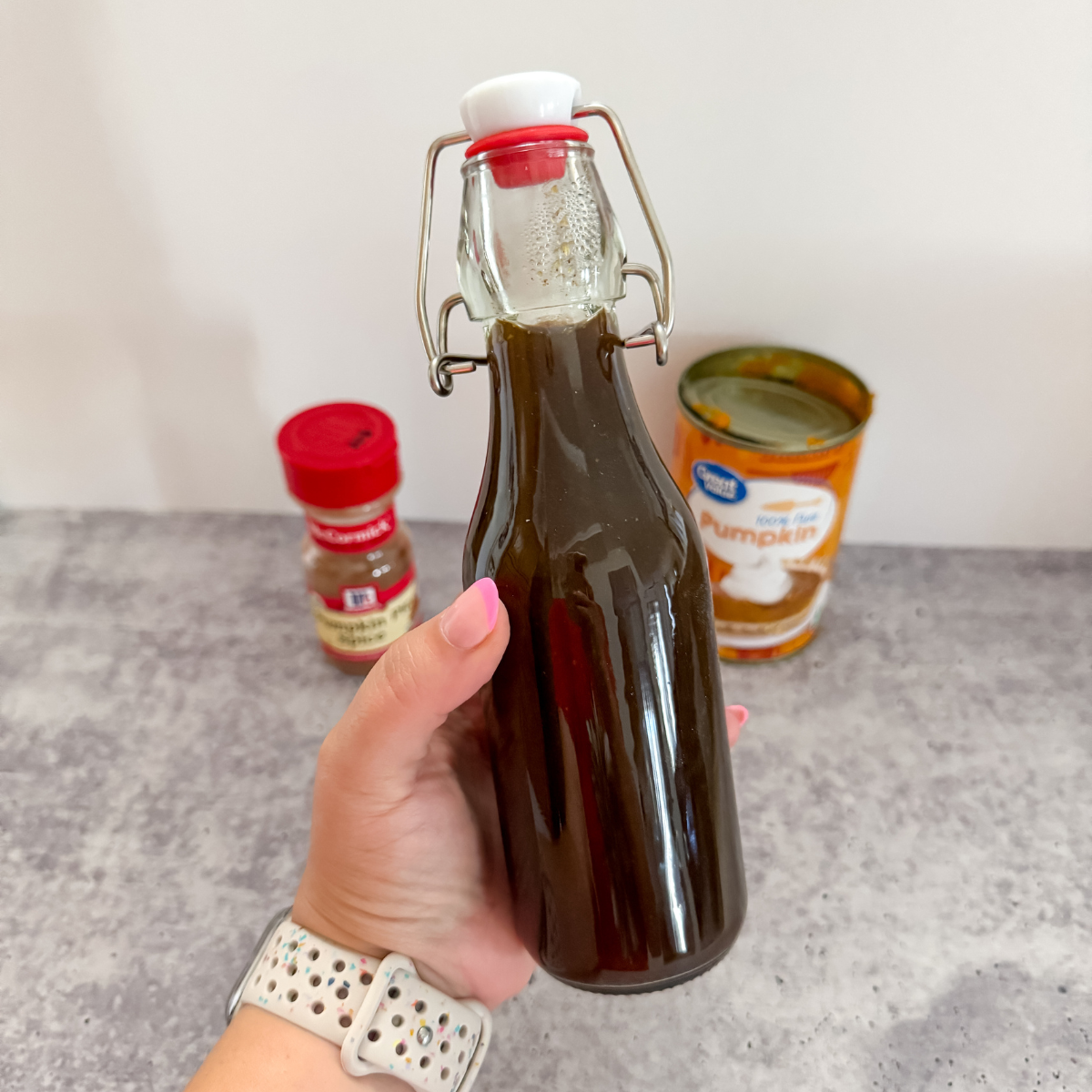 close up of a bottle of pumpkin pie spice coffee syrup