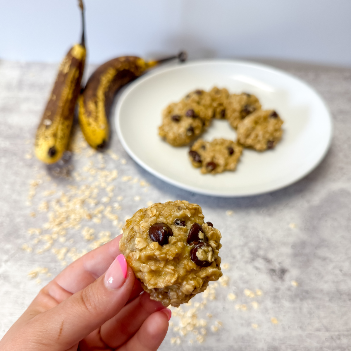 holding a healthy banana cookie